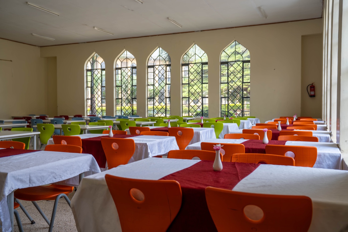 The dining hall set for a meal at Huda Integrated School